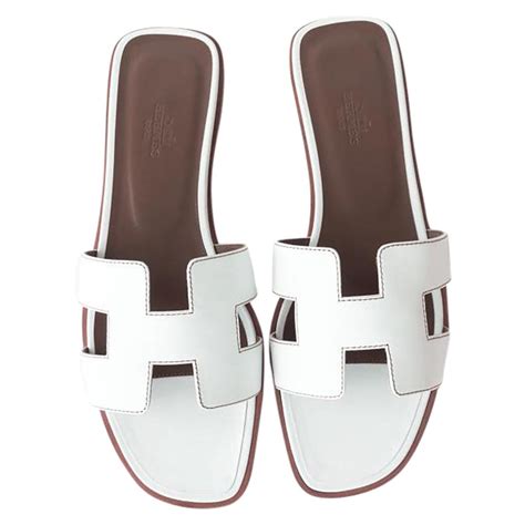 hermes breuningerhermes oran weiss|hermes oran sandals price.